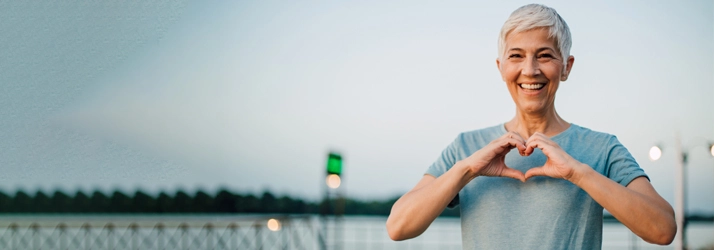 Chiropractic Macon GA Happy Woman With Heart Hands