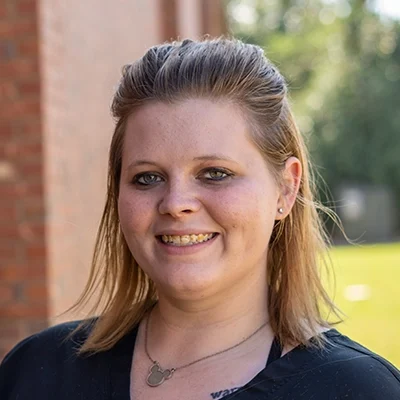 Chiropractic Assistant Tori Smiling Outdoors